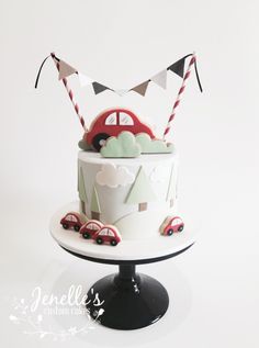 a cake with cars and flags on it