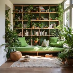 a living room filled with lots of green furniture and potted plants on top of bookshelves