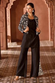 Black short jacket with contrasting floral jaal pattern pearl work embroidery. Comes with coordinating placed embroidered flared pant and solid kurta. - Aza Fashions Elegant Spring Bandhgala Straight Kurta, Elegant Spring Nehru Jacket In Straight Kurta Style, Elegant Nehru Jacket For Spring, Elegant Spring Nehru Jacket, Fitted Outerwear With Resham Embroidery, Elegant Fitted Straight Kurta Outerwear, Fitted Palazzo Set With Set-in Sleeves, Elegant Designer Wear Nehru Jacket For Spring, Elegant Designer Nehru Jacket For Spring