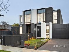 a modern house with black and white architecture