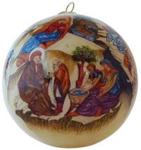 a christmas ornament with an image of jesus and three wise men on it