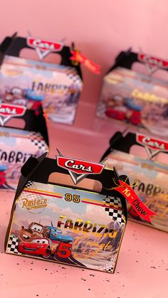 cars birthday party favors with free printables and candy bar wrappers on pink background