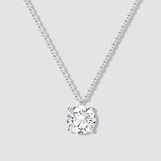 This Stunning Necklace Is A True Piece Of Fine Jewelry. Crafted From 14k White Gold, It Features A Beautiful Round Pendant With One Solitary Diamond. The Pendant Hangs From An 18-Inch Necklace Chain, Making It The Perfect Statement Piece For Any Occasion. The Necklace Is Made With Natural Gemstones And Boasts A Solitaire Setting Style. Its Total Carat Weight Is 1ct, And The Diamond Color Grade Ranges From E-H. Classic Diamond White Necklace For Formal Occasions, Classic Diamond White Necklaces For Formal Occasions, Classic Formal Diamond White Necklaces, Classic Formal Diamond White Necklace, Everyday Luxury Sterling Silver Necklace With Single Diamond, Classic Diamond Necklaces For Formal Occasions, Classic Formal Diamond Necklaces, Classic Single Diamond Necklace For Everyday Luxury, Formal Platinum Necklace With Round Pendant