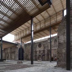 the inside of an old building with stone floors