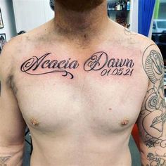 a man with tattoos on his chest has the words maca dawn written in cursive font