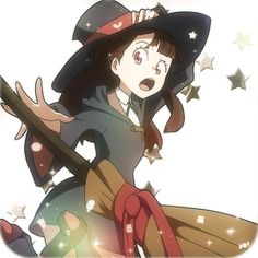 a woman in a witch costume holding a broom and wearing a witches hat with stars around her