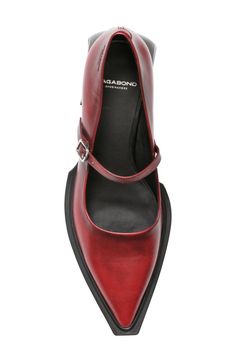 A pointy toe sharpens this modern mary jane pump shaped from smooth leather and set on a flared block heel. 2" heel Leather upper and lining/synthetic sole Imported