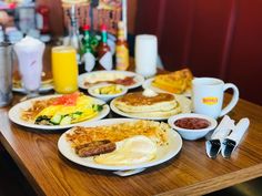 the breakfast is ready to be eaten on the table at the diner's restaurant