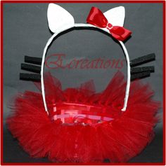 a red headband with ears and a bow