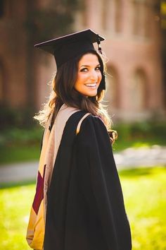 a woman wearing a graduation cap and gown