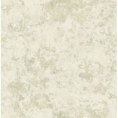 an old, dirty wallpaper with white paint