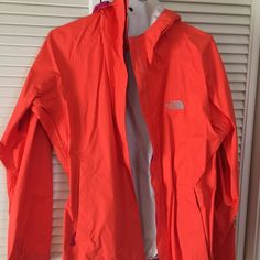 Orange North Face Jacket. Never Worn. The North Face Spring Windbreaker For Outdoor, The North Face Spring Outdoor Outerwear, Pink Outerwear For Fall Outdoor Activities, Pink Outerwear For Outdoor Activities In Fall, Pink Fall Outerwear For Outdoor Activities, Pink The North Face Outerwear For Spring, The North Face Hooded Windbreaker For Spring, The North Face Pink Spring Outerwear, Pink Long Sleeve Outerwear For Outdoor