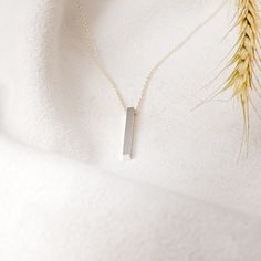 This is a gorgeous and trendy 14K gold engravable bar necklace. This is the perfect necklace to be worn on its own or layered with some of your favorite pieces. Materials: 14K gold cable necklace with a solid verticle bar pendant in a polished finish. Pendant Dimensions: 25x2.6 mm Chain Length: 18 Inches Available in: Silver, 14K rose gold, 14K white gold, or 14K yellow gold ****These necklaces have a 4-week lead time. If you need your necklace sooner than that, please contact us prior to orderi Engraved Bar Necklace, Vertical Bar Necklace, Staghead Designs, Vertical Bar, Bar Pendant, Unisex Ring, Engraved Necklace, Design Silver, Gold Wedding Band