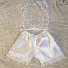 New, Never Worn. Stunning White Lace Bralette And Shorts Set. Thank You For Visiting My Closet, Please Let Me Know If You Have Any Questions, I Offer Great Discounts On Bundles Size Small Lace Stretch Sleepwear For Loungewear, White Lace Trim Short Sleepwear, White Lace Trim Pajama Shorts For Sleep, White Lace Loungewear Sets, White Lace Sets For Loungewear, White Lace Lingerie, White Lace Bralette, Lace Lingerie, Lingerie Sleepwear