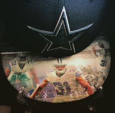 two hats with pictures of football players on them