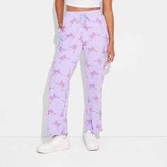 Step out in style with the Women's Self Love Bow Cozy Graphic Pants – Purple. Crafted from a comfortable blend of cotton and polyester, these pants are suitable for all-day wear. The jersey fabric provides a soft feel, while the midweight design ensures year-round comfort. With their straight-leg fit, these pants offer a flattering and on-trend look. Whether you're running errands or relaxing at home, these pants are sure to become a wardrobe staple. Casual Sleepwear Straight Pants For Pajama Party, Casual Cotton Sleepwear Trousers, Casual Sweatpants For Pajama Party In Spring, Casual Spring Sweatpants For Pajama Party, Casual Sweatpants With Elastic Waistband For Pajama Party, Casual Cotton Pants For Pajama Party, Casual Cotton Pajama Party Pants, Casual Straight Pants For Pajama Party, Casual Purple Sweatpants For Loungewear