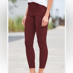 Maroon Jean Stretchy Leggings Fitted Burgundy Bottoms With Pockets, Chic Stretch Burgundy Pants, Trendy Non-stretch Red Leggings, Non-stretch High Waist Burgundy Pants, Trendy Red Non-stretch Leggings, Burgundy Stretch Pants For Workwear, Chic Stretch Burgundy Bottoms, Stretch High Waist Burgundy Bottoms, Stretch Burgundy Trousers