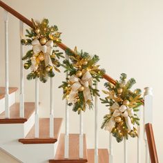 christmas decorations on the banisters and stairs