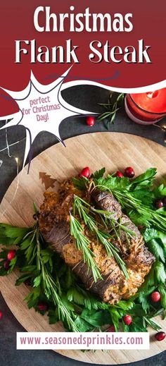 christmas flank steak with fresh herbs on a wooden platter