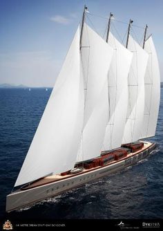 a large white sail boat in the middle of the ocean