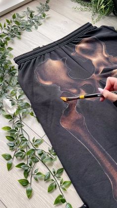 skeleton sweatpants 🤍🩻 | Instagram Bleach Bones Pants, Painted Sweatpants Diy, Bleach Paint Sweatpants, Bleach Painting Sweatpants, Painting On Sweatpants, Black Pants Bleach Art, Bleach Sweatpants Design, Bleached Sweatpants Design, Bleach Sweatpants