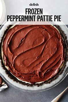 a frozen peppermint pattie pie on a plate with a fork and knife