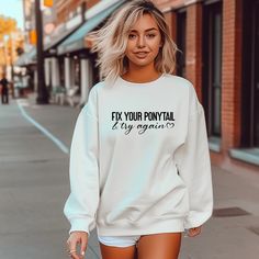 Fix Your Pontytail & Try Again Sweatshirt or Shirt.  Promote mental health to everyone you see.  The world needs you, so let's get it together.    UNISEX SIZING: Our shirts are UNISEX.  They're comfortable and flattering for both men and women, but typically runs slightly large for the ladies! If you're going for a more fitted look, we suggest you size down.  Please refer to the sizing chart in the pictures to find the perfect fit!   CARE INSTRUCTIONS: Wash item inside out in cold water with similar, do not bleach, do not dry clean, do not iron directly on the design. Tumble dry low.   PRODUCTION AND SHIPPING: Processing time: First Class shipping with tracking is 4-5 business days(after processing time).  If you need the item sooner than mentioned time, please upgrade shipping in the cart Funny White Relaxed Fit Sweatshirt, White Relaxed Fit Funny Sweatshirt, Get It Together, Sweatshirt Oversized, Gift For Teacher, Fix You, Don't Give Up, Try Again, Oversized Sweatshirt