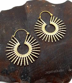 HANDMADE Sunshine hoops. Stunning boho beautiful sun earrings sunburst ethic celestial jewelry  Ideal for everyday wear or for a special bohemian look. SIZE Aprox Length: 5.6 cm Aprox diameter: 4.5 cm Handmade with high quality hypoallergenic Jewelery brass, nickel free. LINK Please follow the link to view my shop for other beautiful pieces. https://www.etsy.com/uk/shop/JagathaStudio Sun Earrings, Celestial Earrings, Boho Beautiful, Boho Hippie Chic, Chic Gifts, Earrings Bohemian, Bohemian Look, Celestial Jewelry, Bohemian Hippie