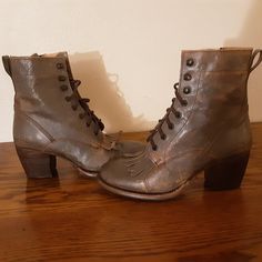 Bed Stu Leather Finis Boots In Smoke Grey Lux, Size 8.5. New In Box With Tags. Never Been Worn, Only Tried On. Some Curling Of Kilt Fringe. Finis Is The Same As Bed Stu's Judgement Style, With A Removable Fringe Kilt At The Base Of The Tongue And Laces. Bought These Before I Figured Out My Bed Stu Size. Turns Out I'm A Size 9, So I Ended Up Getting Another Pair Next Size Up. Smoke Free, Dog Free Home. I Do Have Cats, But They Are Not Allowed In The Room Where These Are Stored. Measurements Lengt Brown Lace-up Boots With Snip Toe And Reinforced Heel, Rugged Heeled Boots With Reinforced Heel, Vintage Lace-up Boots With Reinforced Heel, Brown Moto Boots With Stacked Heel And Round Toe, Brown Moto Boots With Stacked Heel, Western Heels With Leather Sole And Round Toe, Brown Western Heels With Almond Toe, Rustic Brown Lace-up Boots, Brown Western Almond Toe Heels