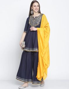 Dive into sophistication with the Navy Blue Cotton Sharara Suit 🌊👗 A perfect fusion of classic charm and modern style. Elevate your look with this stunning and versatile ensemble! 💃✨ #NavyBlueShararaSuit #CottonElegance #SophisticatedModernStyle #VersatileBeauty Yellow Embroidered Palazzo Set For Festivals, Blue Palazzo Set With Embroidered Border For Navratri, Festival Blue Palazzo Set With Embroidered Border, Blue Cotton Dupatta With Dori Work, Blue Embroidered Cotton Sharara, Cotton Sharara Suits, Cotton Sharara, Kurta Set With Dupatta, Kids Kaftan