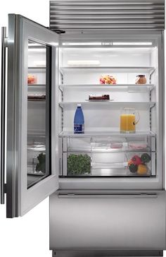 an open refrigerator with food and drinks in it