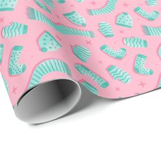 a pink and blue wrapping paper with fish on it