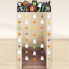 a halloween door decoration with ghost and stars