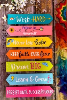 colorful wooden signs that say work hard, believe in yourself, never lose hope keep faith over fear learn and grow