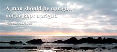 a man should be upright, not to keep upright quote on the beach at sunset