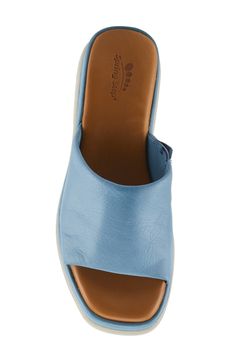 A subtle platform and chunky heel elevate a leather slide sandal fitted with a gore inset on cushioned footbed for optimal comfort. 2" heel; 1" platform Elastic gore inset Memory foam cushioning Leather upper and lining/synthetic sole Made in Turkey Casual Wedge Heel Platform Slippers With Heel Loop, Casual Wedge Heel Platform Slippers, Casual Blue Platform Slippers With Round Toe, Comfortable Platform Slide Wedge Sandals, Comfortable Slide Wedge Sandals With Platform, Comfortable Wedge Sandals With Platform, Comfortable Slip-on Wedge Sandals With Ortholite Insole, Comfortable Platform Slippers With Removable Insole And Round Toe, Blue Round Toe Platform Slippers For Spring