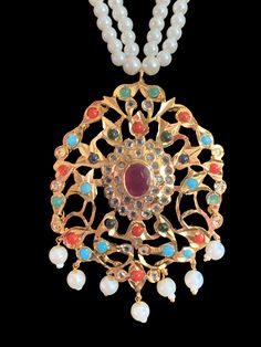 pendant with earrings made using shell pearls with navratan stones and 22ct gold plating Navratan Pendant Set, Navarathna Pendant, Navrathan Pendants, Navaratna Pendent Gold, Navaratna Pendants Gold, Silver Jewelry Earrings, Silver Jewelry Pendant, Jewelry Design Necklace, Pendant Set