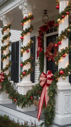 christmas decorations on the front porch of a house