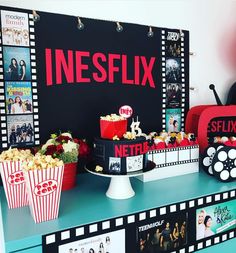 a movie themed birthday party with popcorn and cakes