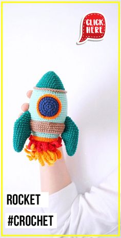 a crocheted rocket ship is on top of a hand with the caption rocket crochet