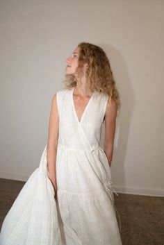 The BLANCHE Dress is a dreamy, billowy, three-tiered dress featuring delicate ties inside and outside. It is made with a special, monochromatic plaid and wraps for a deep v-neck. 100% Linen (medium weight) Side pockets Made in Mexico Denim Outerwear, Inside And Outside, Knitwear Dress, Mid Dresses, Tiered Dress, Vintage Children, Deep V Neck, Coat Dress, Vintage Tops