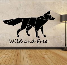 a wall decal with the words wild and free on it