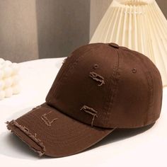 Brand New In A The Bag Brown Summer Baseball Cap, Trendy Brown Visor Baseball Cap, Casual Distressed Brown Baseball Cap, Brown Baseball Cap With Visor For Spring, Brown Baseball Cap For Spring, Casual Brown Baseball Cap For Summer, Brown Visor Baseball Cap For Spring, Casual Brown Baseball Cap For Spring, Distressed Brown Summer Hat