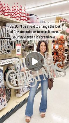 a woman standing in front of a christmas sign with the words pov don't be afraid to change the look of christmas decor to make it more your style even if it's brand new