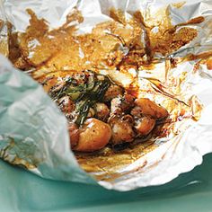 some food that is sitting in foil on a table