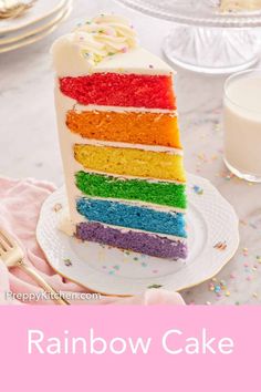 a slice of rainbow cake on a plate