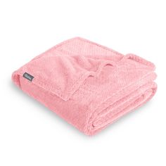 a pink blanket folded on top of each other