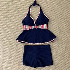 Boutique Blue Halter Top And Boyshorts Swim Set. Padded Top Ties Around The Neck With Heart Detail. Hygienic Liner Still In Tact. Size L (But Fits Like A Small). Brand New With Tags. Fitted Navy Tankini For Vacation, Navy Fitted Tankini For Vacation, Navy Sleeveless Tankini For Beach Season, Sleeveless Navy Tankini For Beach Season, Navy Fitted Swimwear, Navy Sleeveless Tankini For Summer, Navy Fitted Short Swimwear, Blue Swimwear With Built-in Shorts For Summer, Blue Summer Swimwear With Built-in Shorts