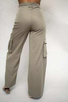 These utility cargo pants make an impact while providing a relaxed fit. Style them with statement heels or casual sneakers for a versatile look. SIZE & FIT Model is wearing a size x-small FEATURES Utility pockets Wide leg pants Hidden pant hook Zip front closure DETAILS 65% Tencel, 35% Lycra CARE Hand wash cold; Do not bleach; Line dry; Do not dry clean Khaki Wide Leg Cargo Bottoms, Khaki Wide Leg Cargo Style Bottoms, Versatile Wide Leg Cargo Bottoms, Versatile Wide Leg Cargo Style Bottoms, Trendy Cargo Style Workwear Bottoms, Trendy Cargo Style Bottoms For Workwear, Trendy Full-length Khaki Cargo Pants, Trendy Full Length Khaki Cargo Pants, Casual Wide Leg Pants With Flap Pockets