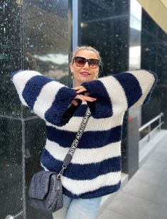 Striped Mohair Sweater Navy Blue and White, Step into style with our women's striped sweater. The classic navy blue and white stripes offer a timeless look, making it a versatile addition to any wardrobe. 🌟 Experience the softness and comfort of our oversized nautical pullover. The mohair blend provides warmth without the weight, ideal for staying cozy on cooler days. 📏 Size for Every Woman: Available in multiple sizes, our sweater is designed to flatter every figure. Consult our sizing guide Oversized Striped Cozy Sweater, Cozy Oversized Striped Sweater, Oversized Winter Sweater With Contrast Stripes, Navy Casual Sweater With Contrast Stripes, Casual Winter Sweater With Vertical Stripes, Nautical Long Sleeve Sweater For Winter, Nautical Long Sleeve Sweater For Fall, Sweater Navy Blue, Oversize Pullover